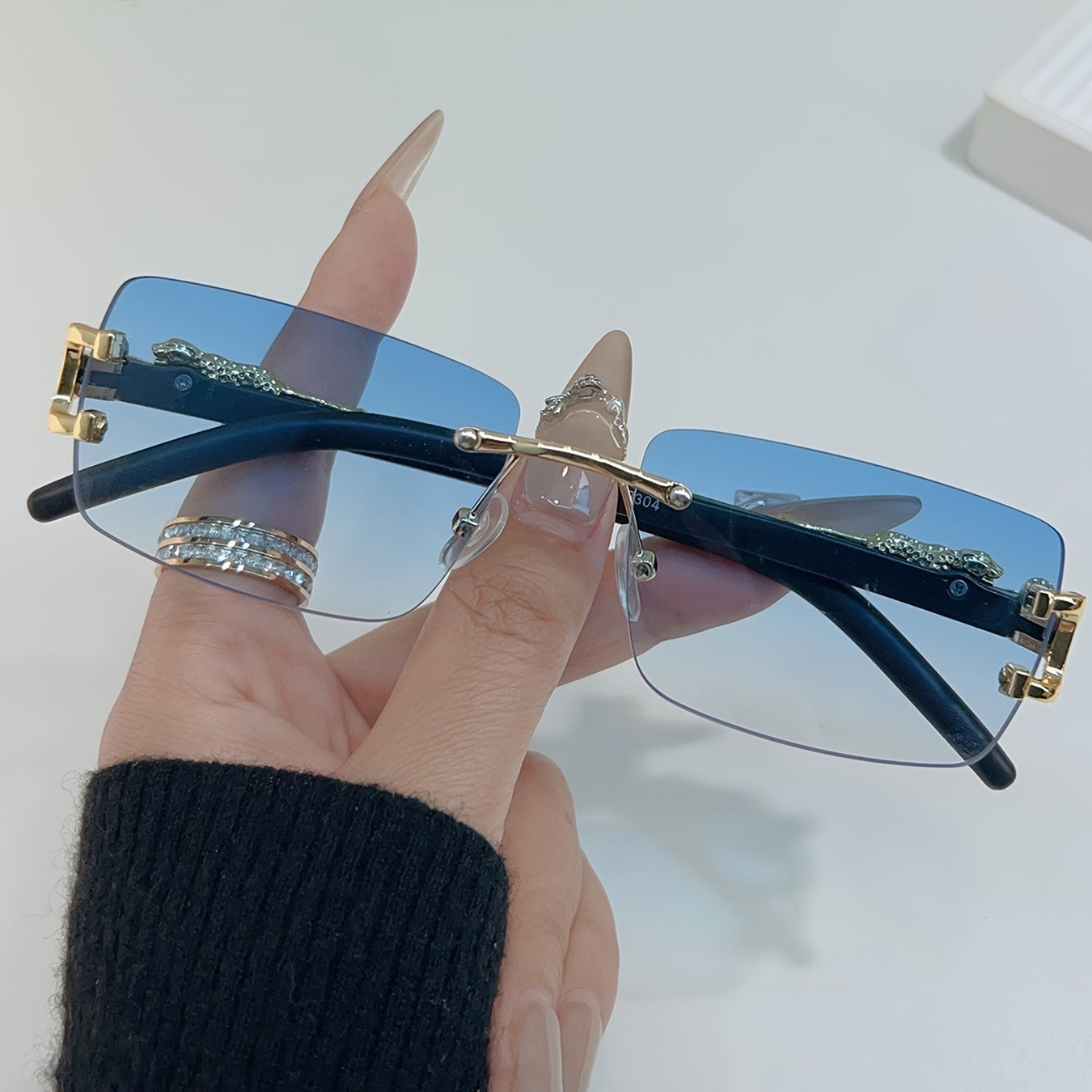 Minimalist, Chic Retro Rimless Fashion Glasses with Cheetah Accent